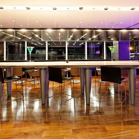 Holiday Inn Santo Domingo By Ihg Exteriér fotografie The interior of the lounge