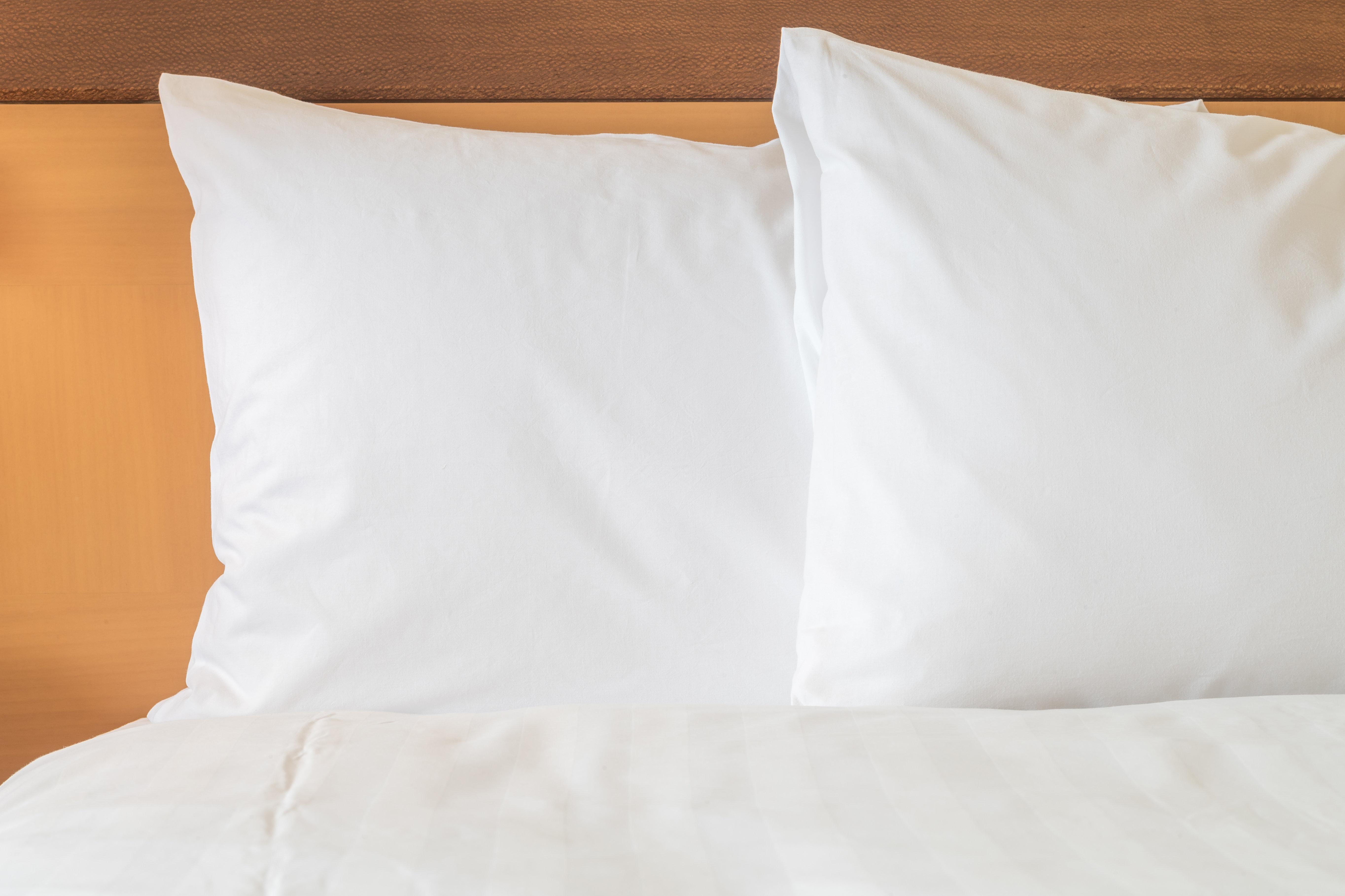 Holiday Inn Santo Domingo By Ihg Exteriér fotografie Two pillows on a bed